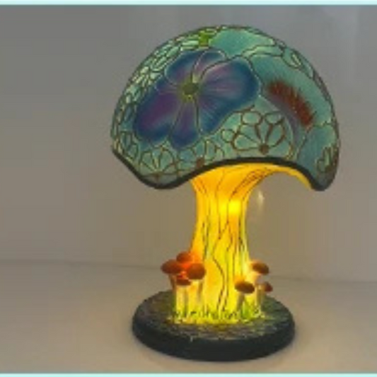 Lampe champignon bleu avec des symboles fleurs